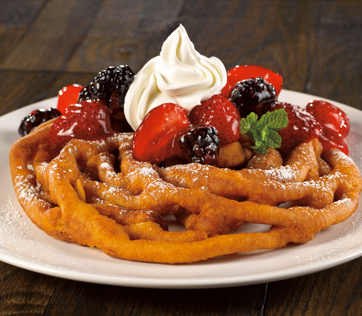 Funnel Cake with Berries and Whipped Cream