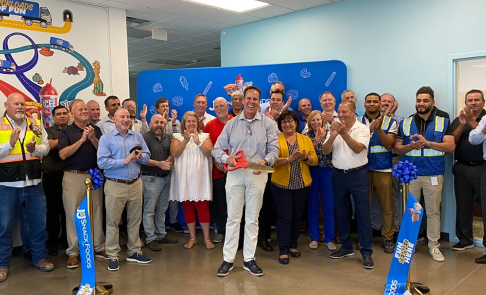 J&J Snack Foods employees cut the ribbon on a new Texas distribution facility in July to assure fast and efficient service to foodservice operators.
